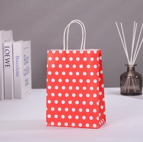 KIRMIZI PUANTİYELİ BÜKÜM SAPLI  - ORTA BOY KAĞIT ÇANTA 25X31 CM 100 ADET